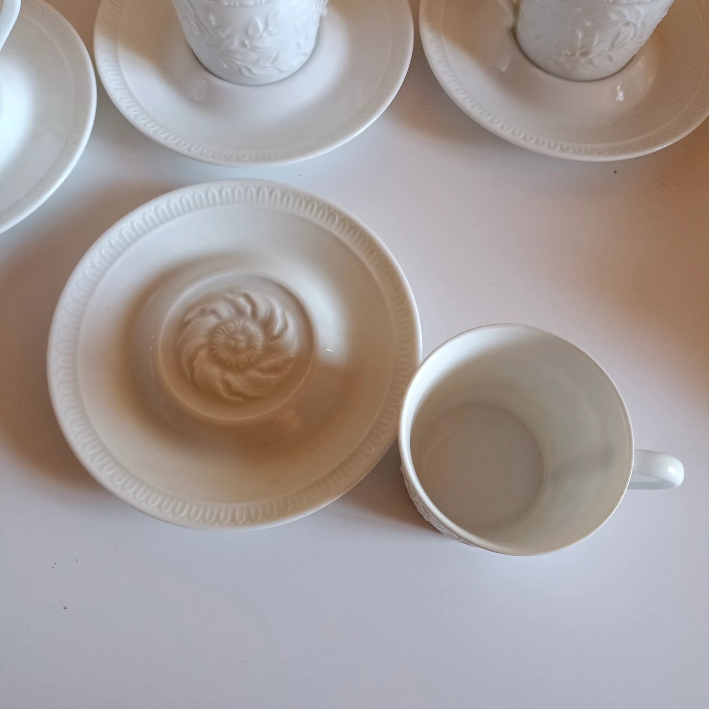 4 Bernardaud white porcelain coffee cups and saucers