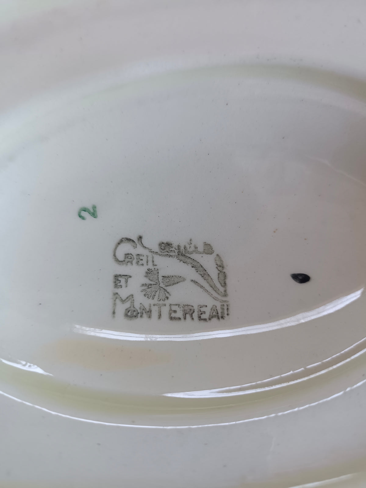 Saucière en faïence Creil & Montereau, modèle "Oeillet"