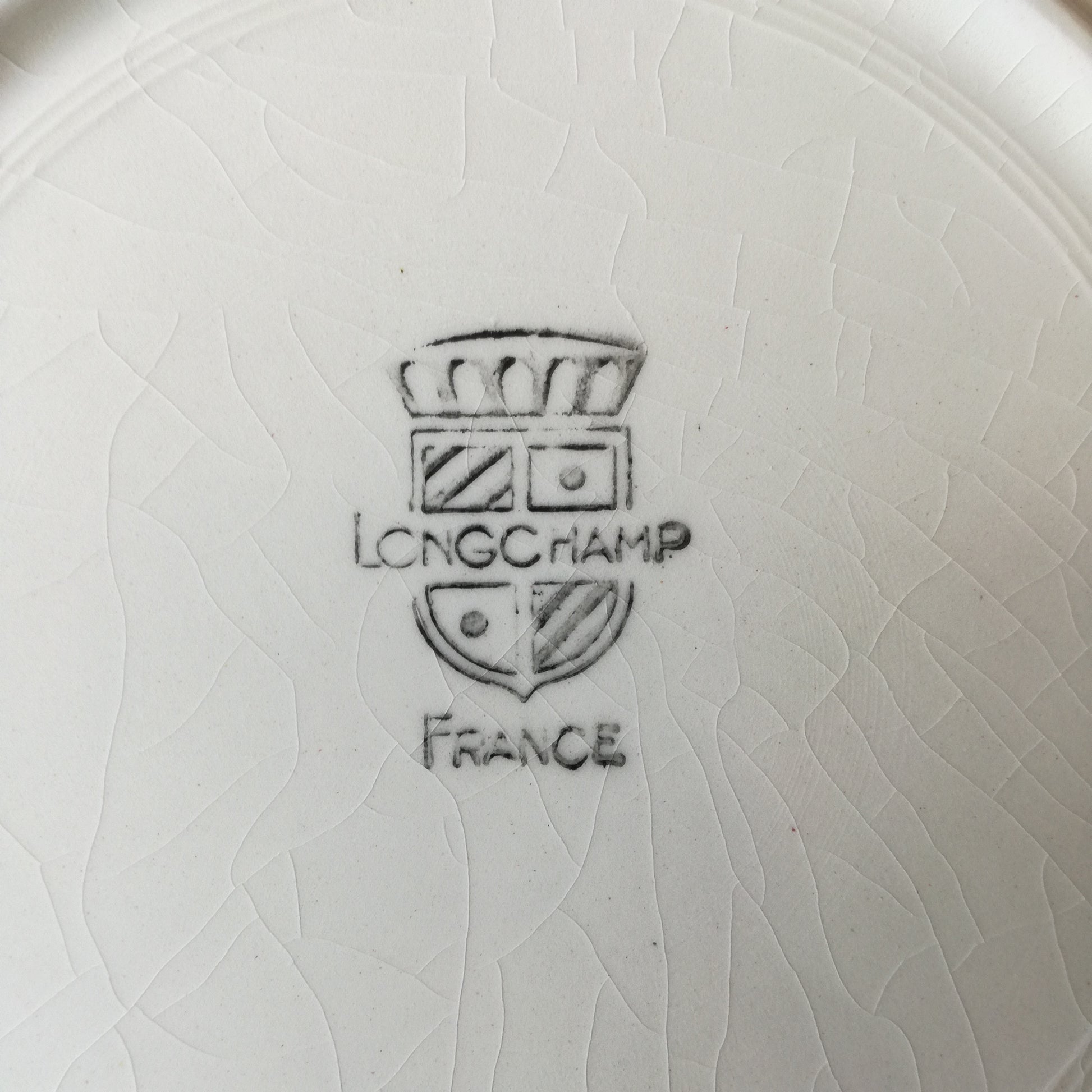 Assiette - creuse / calotte  Longchamp