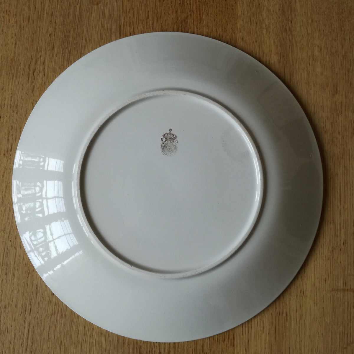 Grand plat rond à fleurs roses et jaunes, K & G Lunéville Badonviller