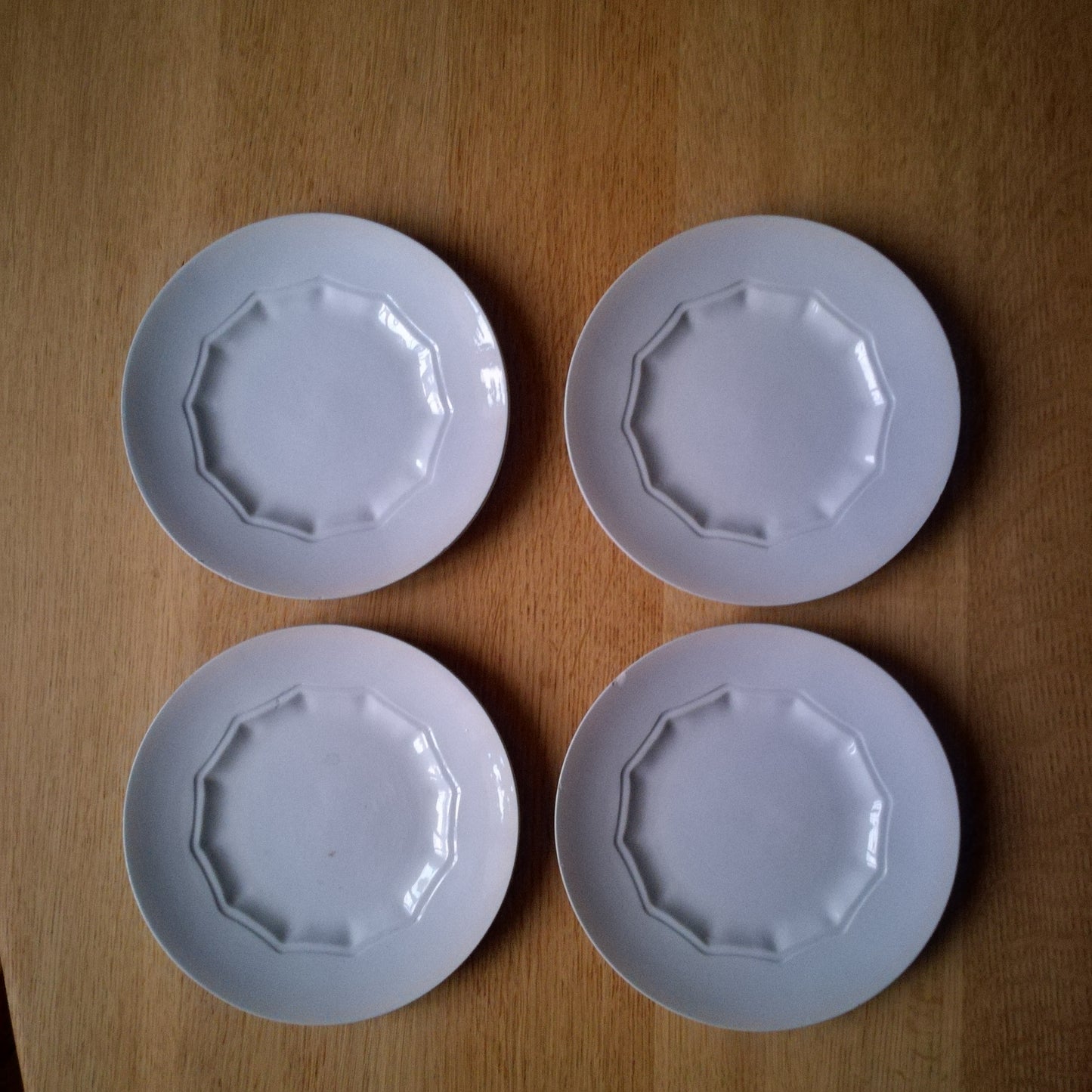 4 petites assiettes bleu pâle, HBCM