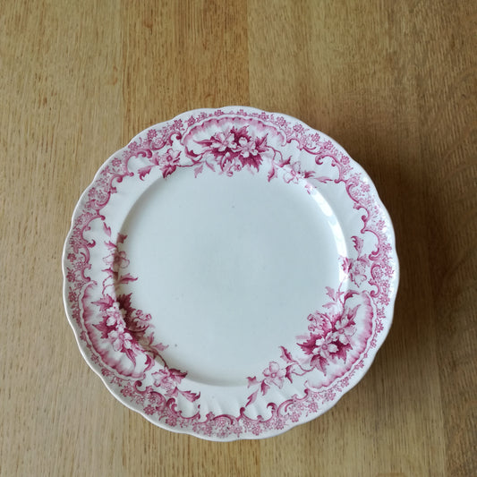 Plat sur pied à décor de frise d'anémones rose