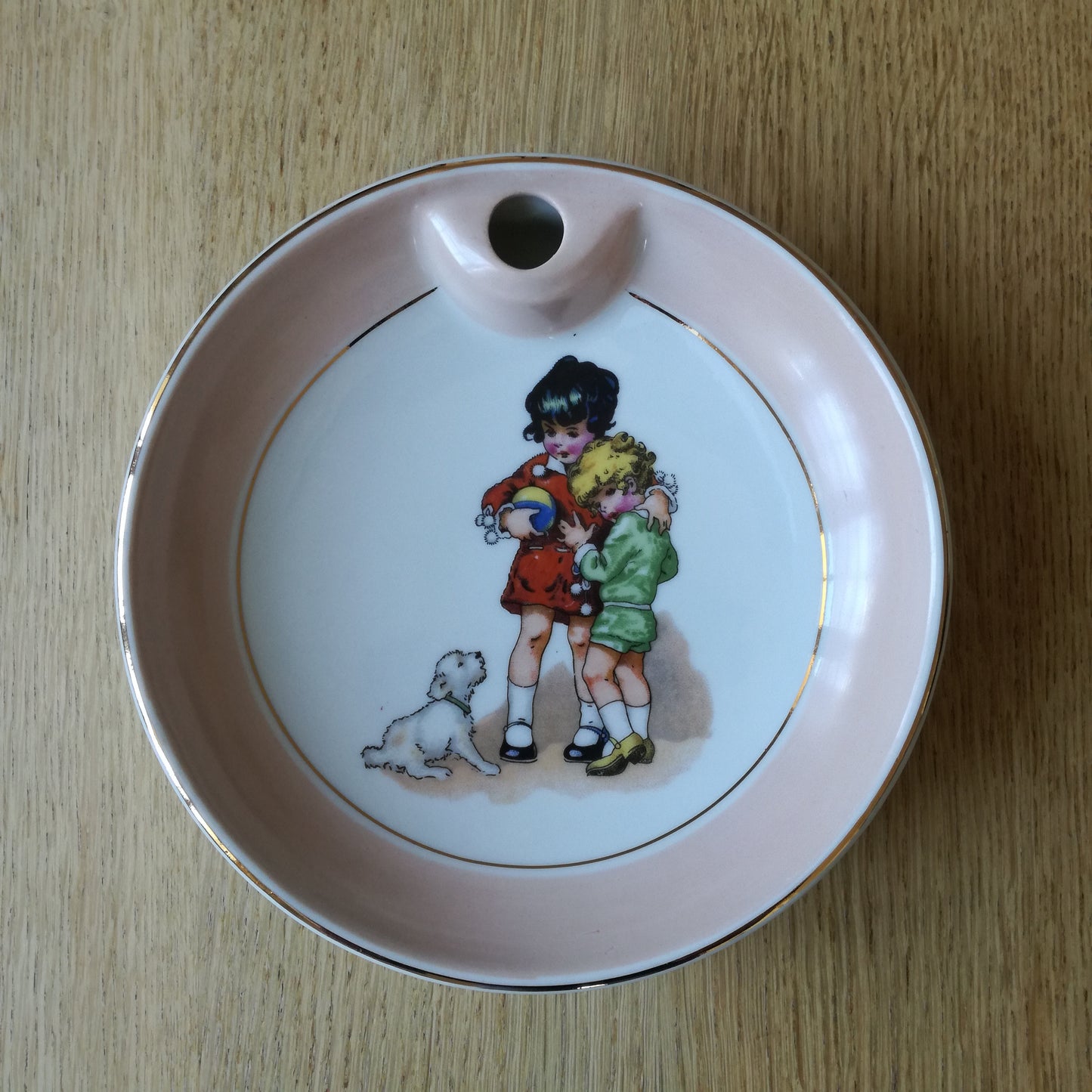 Assiette chauffante à décor d'enfants & de chiot, Limoges