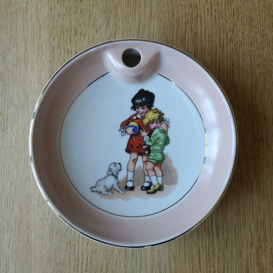 Assiette chauffante à décor d'enfants & de chiot, Limoges