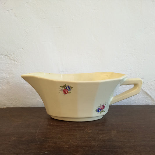 Saucière en faïence à décor de fleurs bleues et roses, Digoin