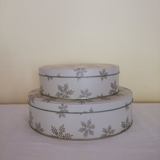 2 boîtes en métal à décor de flocons de Noël