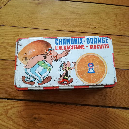 Boîte à biscuits ancienne en métal Chamonix-Orange L'Alsacienne Obélix et Astérix
