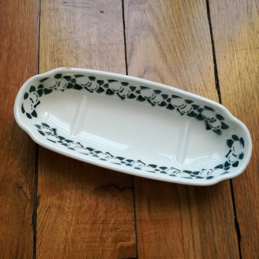 Porte peigne en faïence ancienne à décor de fruits vert foncé Saint Amand