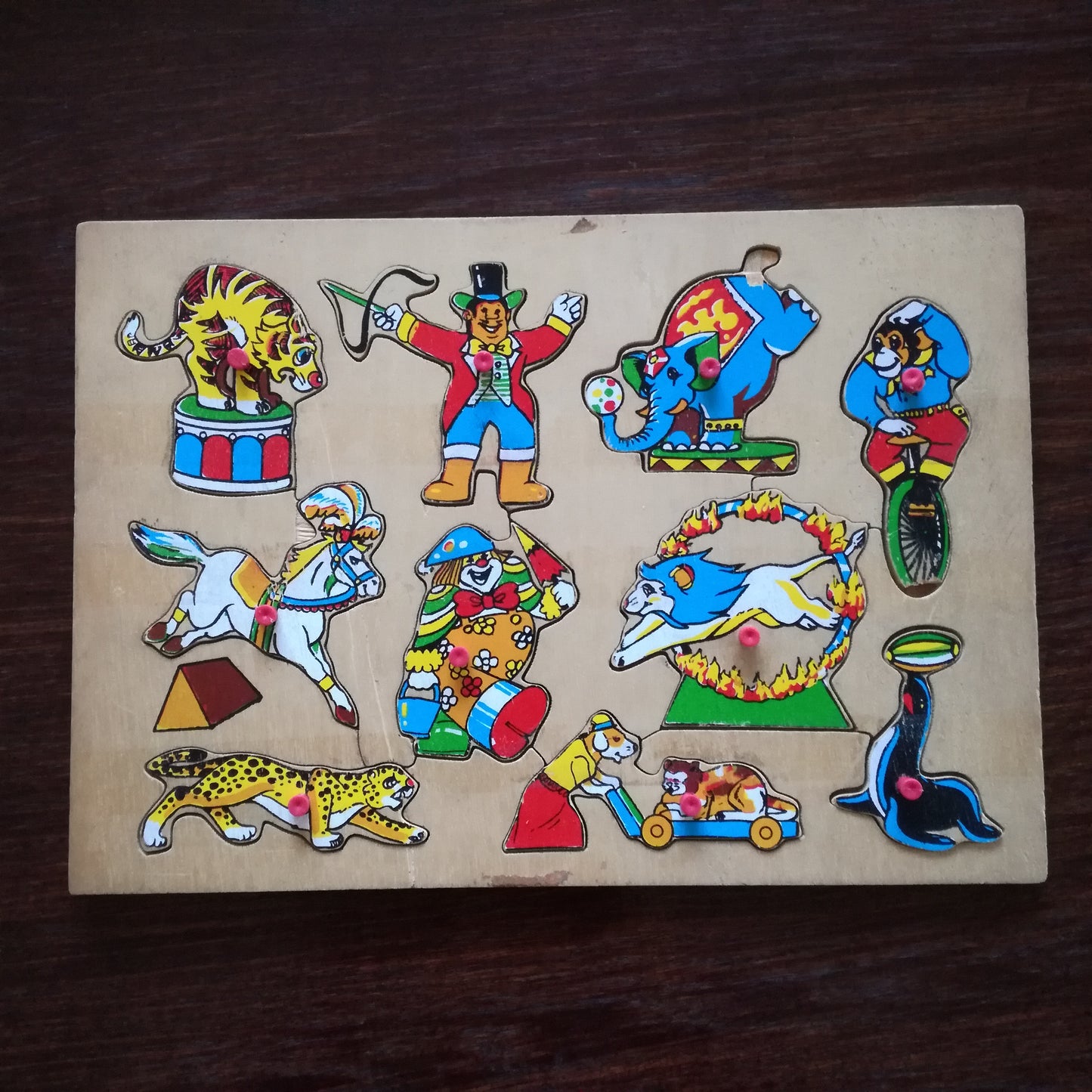 Puzzle jeu de formes ancien en bois sur le thème du cirque