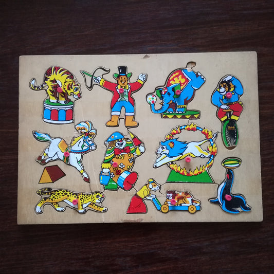 Puzzle jeu de formes ancien en bois sur le thème du cirque