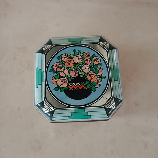 Boîte en métal / ancien poudrier Avon, décor style Art Deco