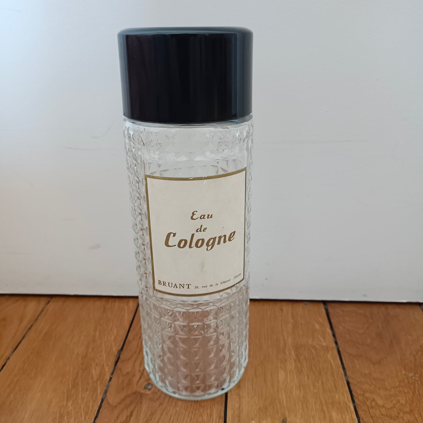 Grand flacon ancien en verre Eau de Cologne Bruant Dijon