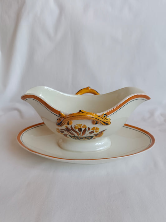 Saucière en faïence Creil & Montereau, modèle "Oeillet"