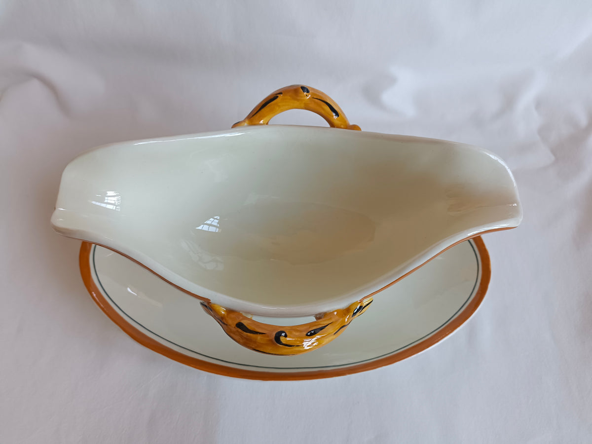 Saucière en faïence Creil & Montereau, modèle "Oeillet"