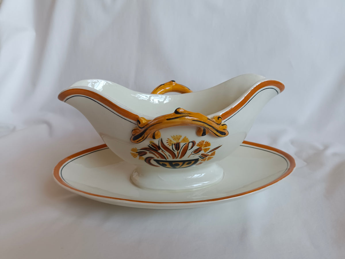Saucière en faïence Creil & Montereau, modèle "Oeillet"