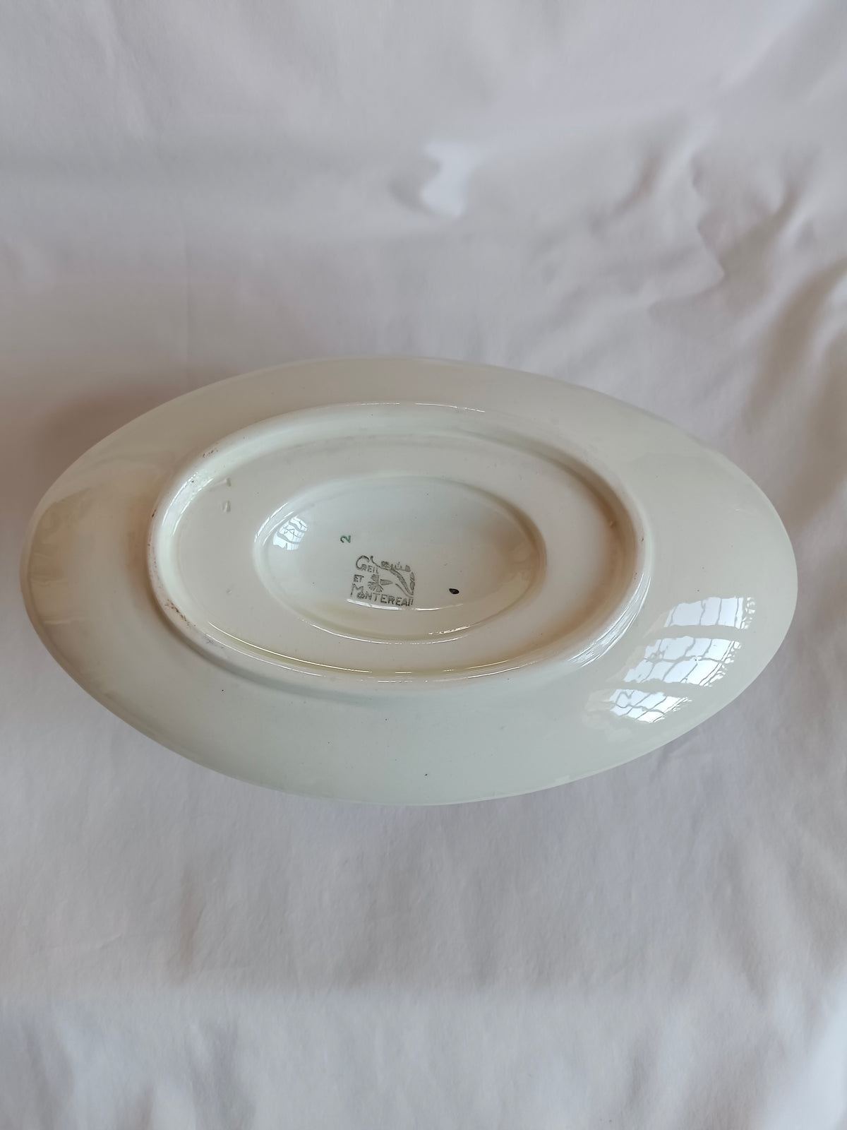 Saucière en faïence Creil & Montereau, modèle "Oeillet"